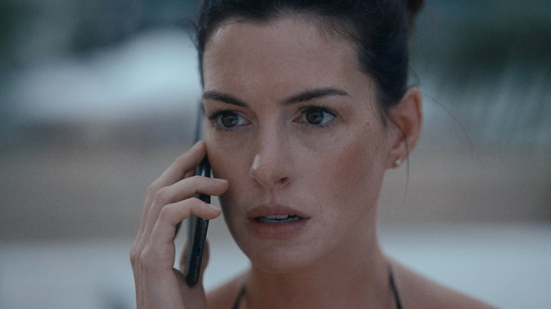 A closeup of Rebekah Neumann on the telephone in WeCrashed