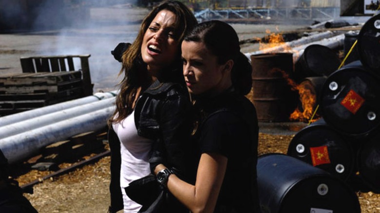 Emmanuelle Vaugier's Valerie looks scared and uncomfortable in Far Cry