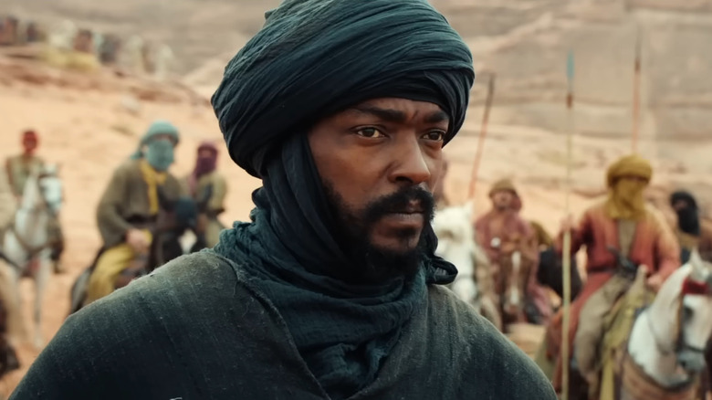 Anthony Mackie as Hanzala on his horse in front of an army in Desert Warrior
