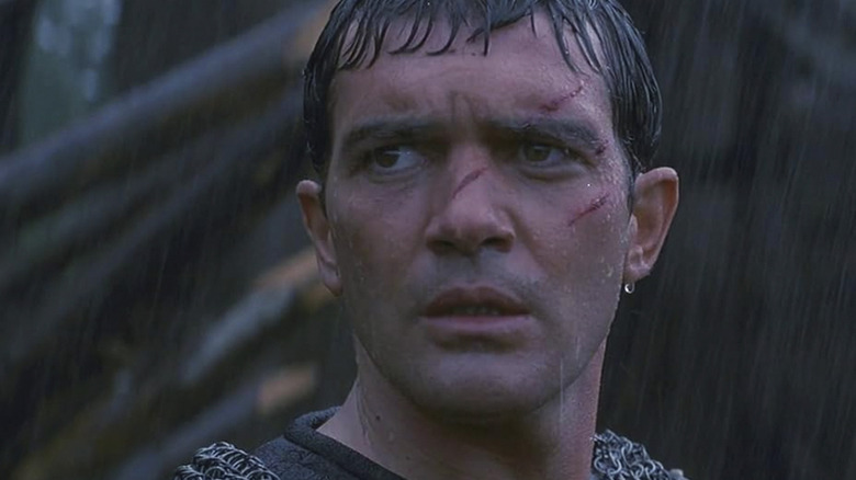 Antonio Banderas stands in the rain as Ahmad ibn Fadlan in The 13th Warrior