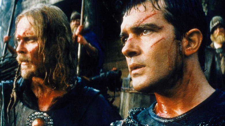Antonio Banderas as Ahmad ibn Fadlan and Dennis Storhoi as Herger are battle scarred in The 13th Warrior