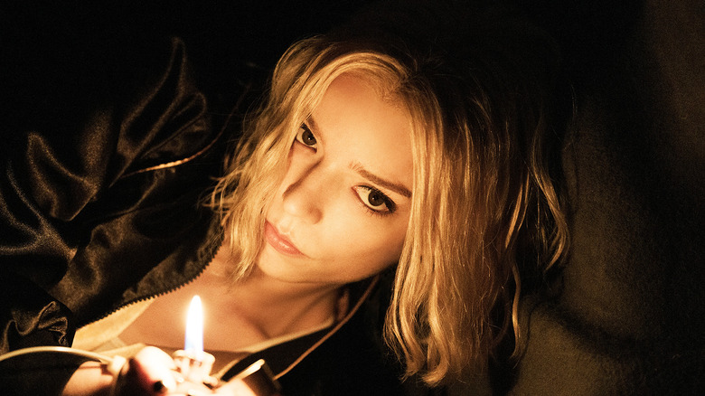 Anya Taylor-Joy's Lucky Armstrong lights a lighter in Lucky