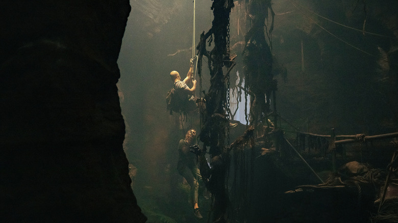 Ben and Sasha descend into a cave in Apex