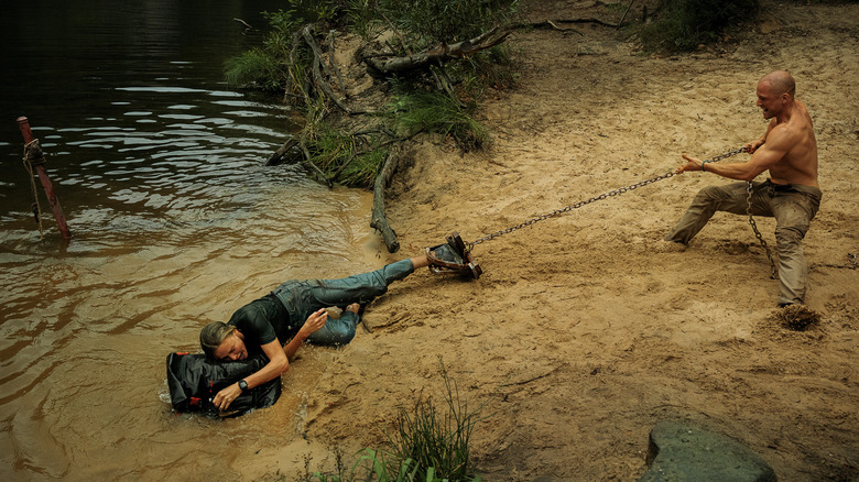 Ben pulls Sasha by a chain in Apex