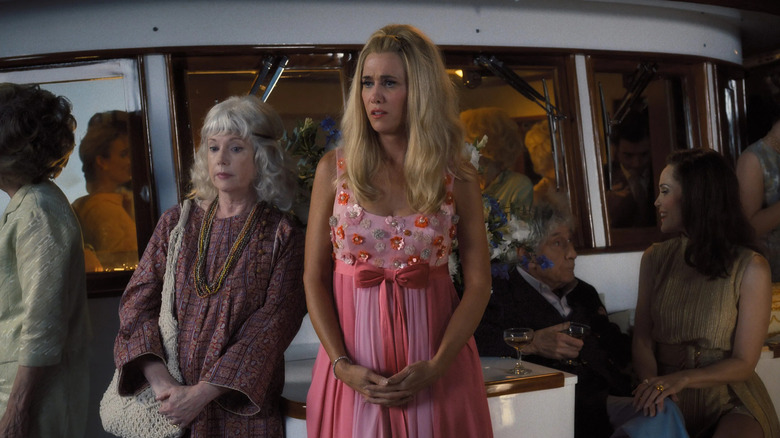 Maxine (Kristen Wiig) wearing a pink dress on 