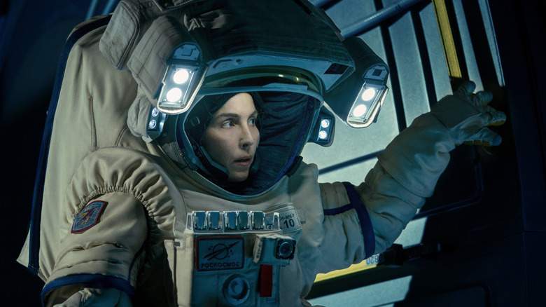 Noomi Rapace as Jo Ericsson in her spacesuit in Constellation