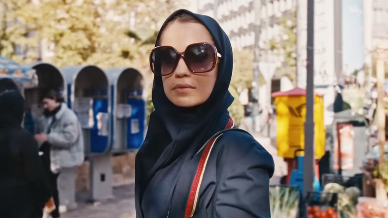 Niv Sultan's Tamar Rabinyan stands in a crowded street in Tehran