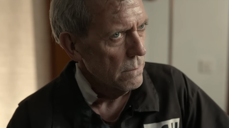 Hugh Laurie's Eric Peterson is seen in closeup in Tehran
