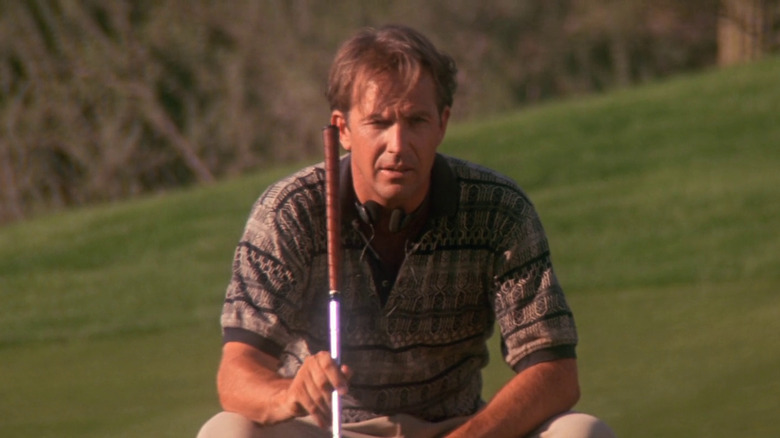 Kevin Costner while Roy was running on the green color in the tin cup