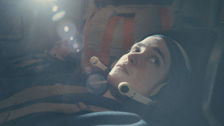 Alice Englert as a cosmonaut prepared to head to space in Star City
