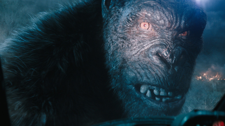 King Kong in the role of King Kong snarling at the occupants of an aerial vehicle and baring his teeth in Monarch: Legacy of Monsters season 2