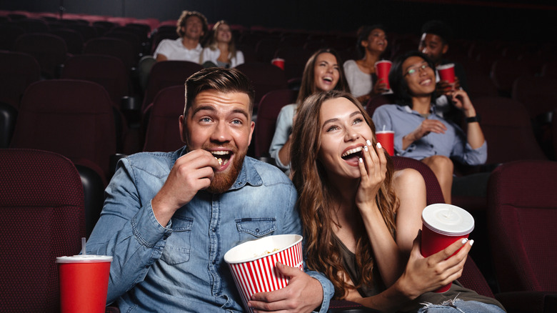Movie theater couple popcorn