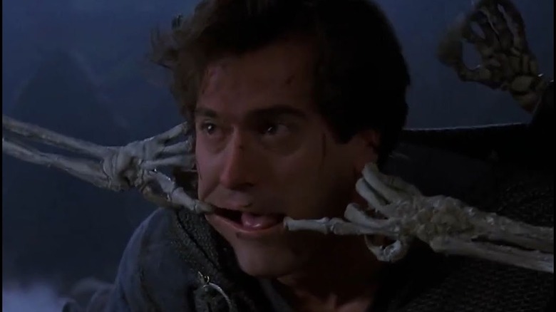 Army of Darkness skeleton hands in ash's mouth