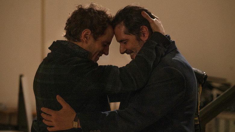 two men embracing each other in the movie brother and sister
