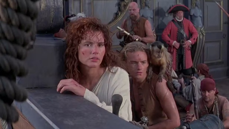 Morgan (Geena Davis) and a group of pirates hanging out on a ship in "Cutthroat Island."