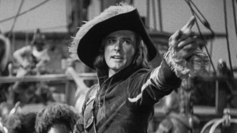Peter Blood (Errol Flynn) pointing in "Captain Blood."