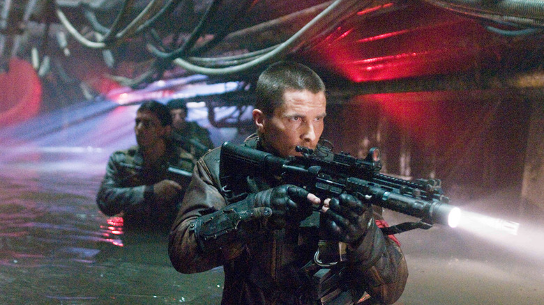John Connor stalking through a sewer with a gun
