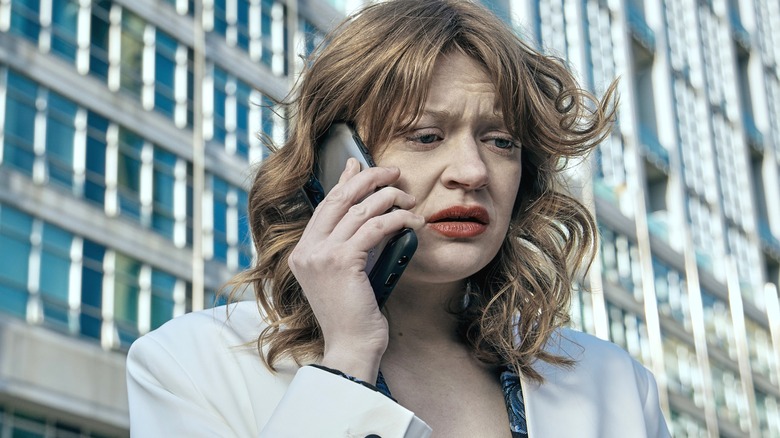 Ashley looks worried while speaking to someone on call in season 3 of The Boys