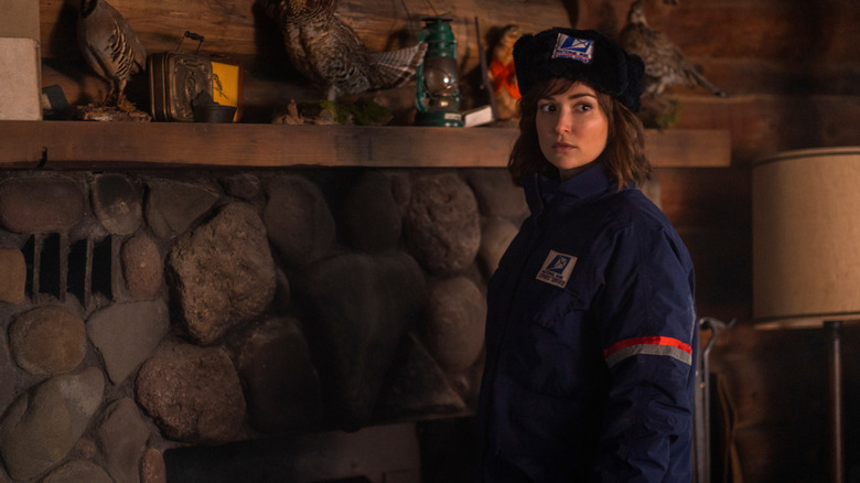 Cecily Moore in front of the fire in Werewolves Within