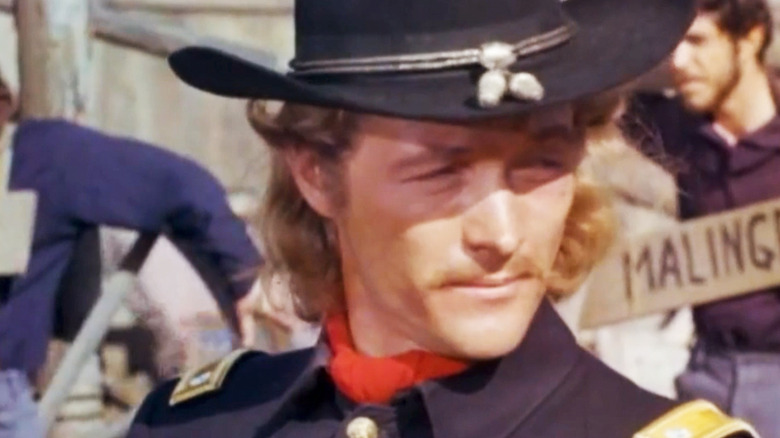 Wayne Maunder's Lieutenant Colonel George Armstrong Custer looks off to his left in closeup in Custer
