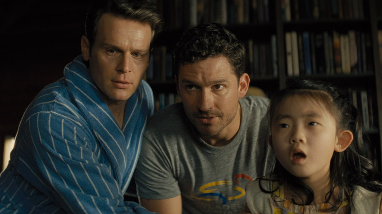 Jonathan Groff, Ben Aldridge and Kristen Cui in Knock at the Cabin