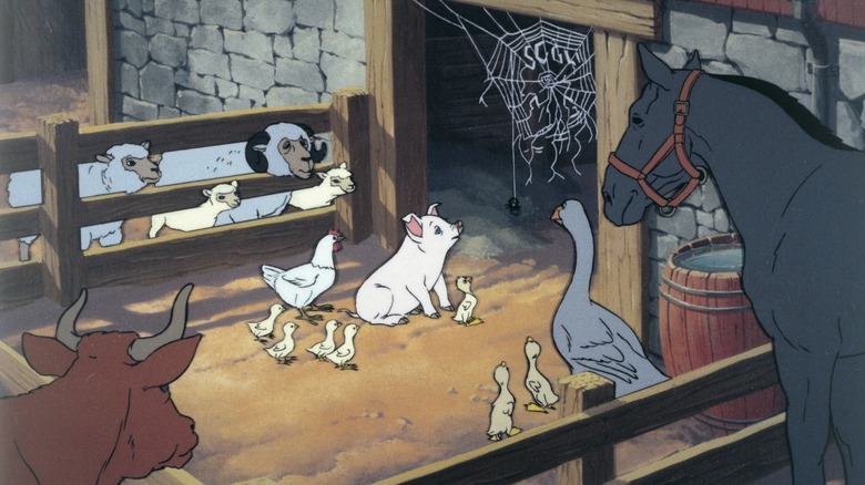 Wilbur and the other farm animals looking at Charlotte in Charlotte's Web