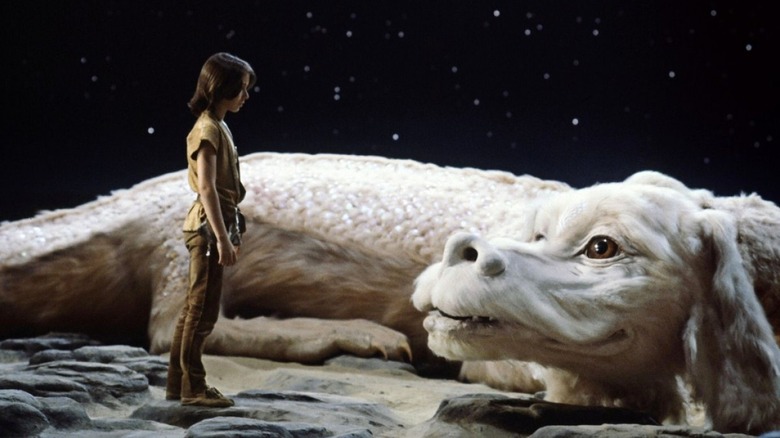 Bastian (Barret Oliver) looking at Falkor in The Neverending Story
