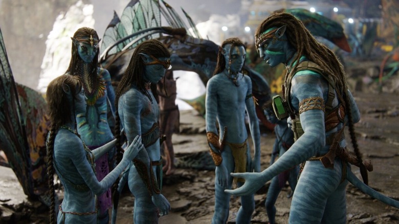 The Sully family gathered around in Avatar: The Way of Water