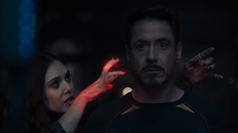 Elizabeth Olsen as Scarlet Witch getting into the head of Robert Downey Jr. as Tony Stark in Avengers: Age of Ultron