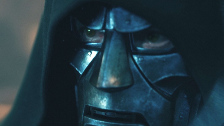A close up of Robert Downey Jr. as Doctor Doom as he's fighting Thor in Avengers: Doomsday