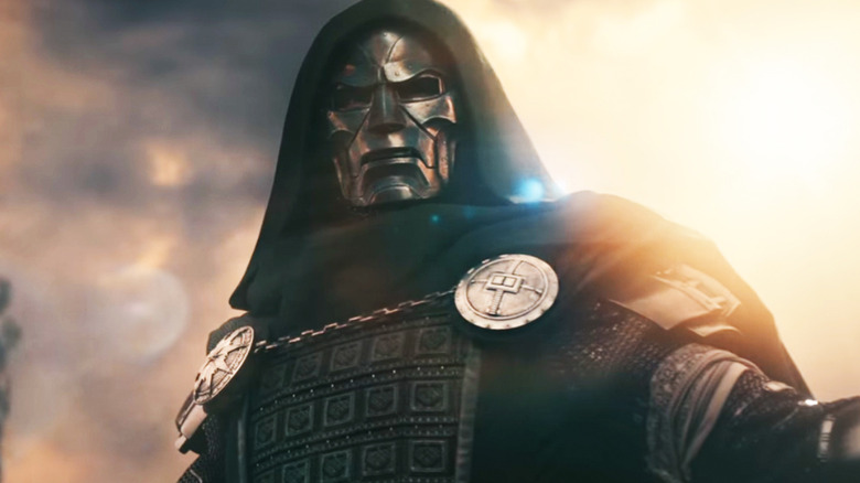 Robert Downey Jr's Doctor Doom is seen standing against a cloudy sky in Avengers Doomsday