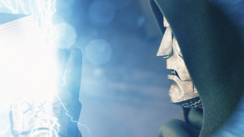 Doctor Doom calmly stopping Thor's axe attack with a few fingers in Avengers: Doomsday