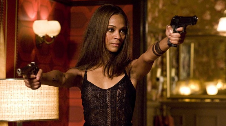 Zoe Saldana Firing Guns