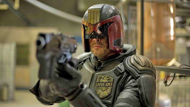 Dredd points gun