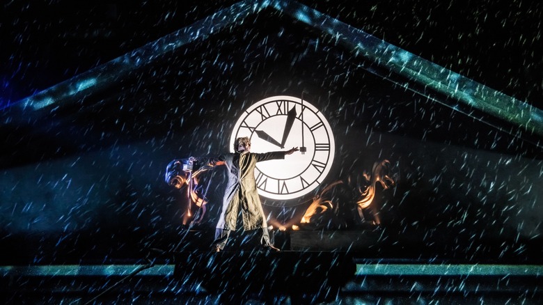 Back to the Future: The Musical's Roger Bart as Doc Brown perched on the clocktower