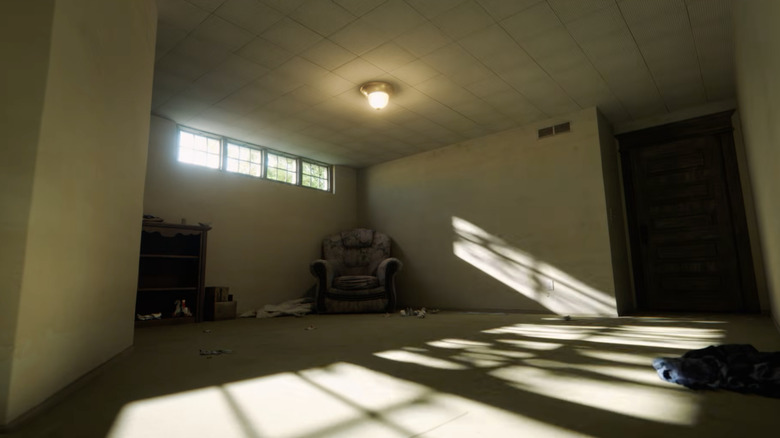 A mostly empty and dimly lit room in Backrooms