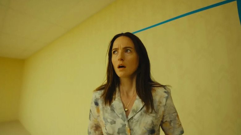 Mary looks shocked as she enters the Backrooms in Backrooms