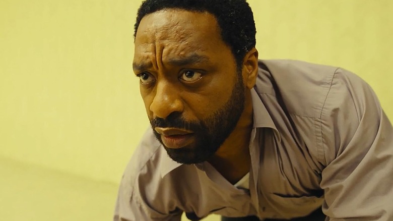 Chiwetel Ejiofor as Clark looking perplexed in Backrooms