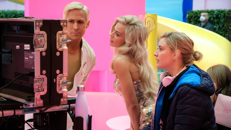 RYAN GOSLING, MARGOT ROBBIE and Director/Writer GRETA GERWIG on the set of Warner Bros. Pictures' BARBIE