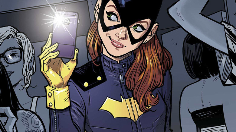 Batgirl taking a photo