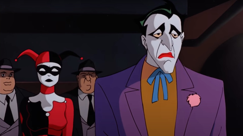 Joker grieving at Batman's funeral