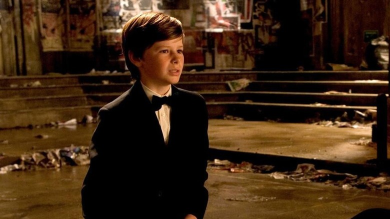 Batman Begins, young Bruce Wayne kneeling