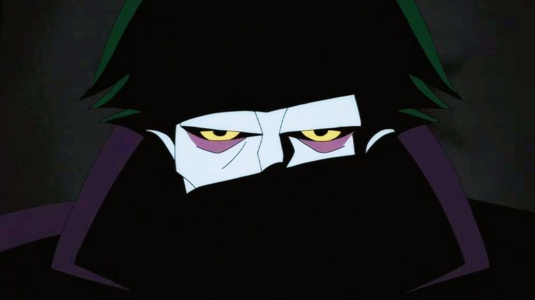The Joker in shadow in Batman: Caped Crusader