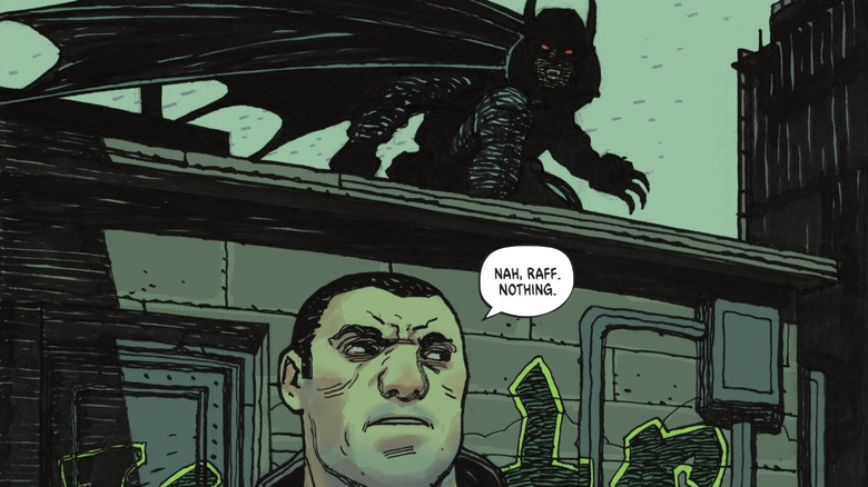 Absolute Batman issue No. 4 Bruce in his first Batman costume that falls shortly before the criminal
