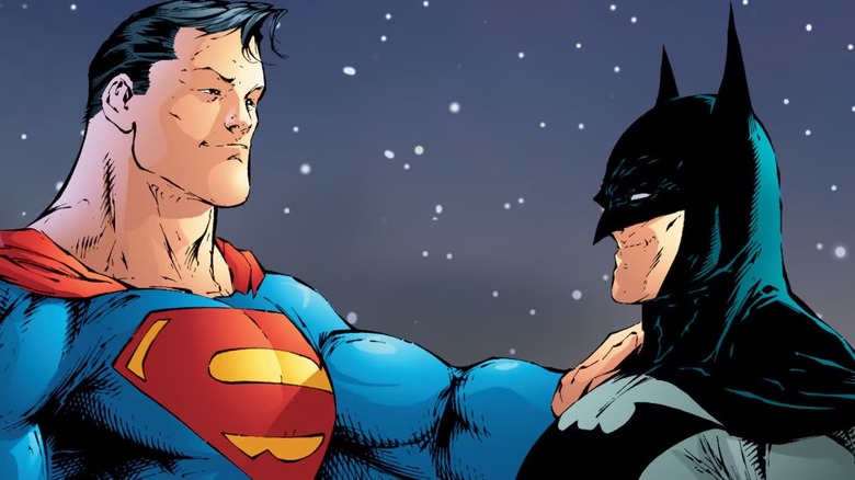 Superman and Batman looking at each other