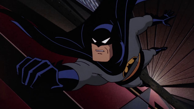 Batman: The Animated Series Batman holding onto skyscraper ledge