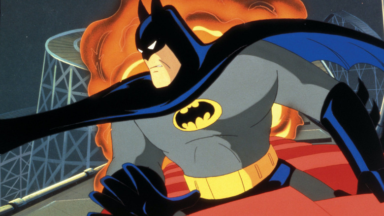 Batman evading an explosion in Batman: The Animated Series