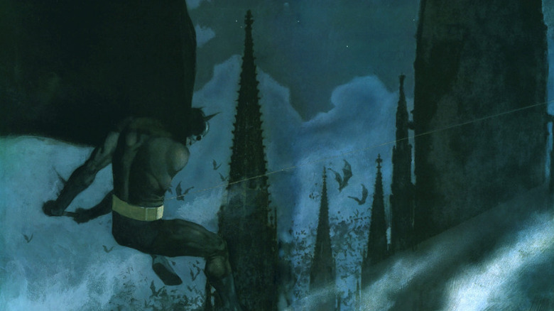 Batman schommelt door de skyline van Gotham in een paneel uit Batman Night Cries