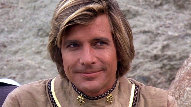 Lieutenant Starbuck (Dirk Benedict) smiling in Battlestar Galactica