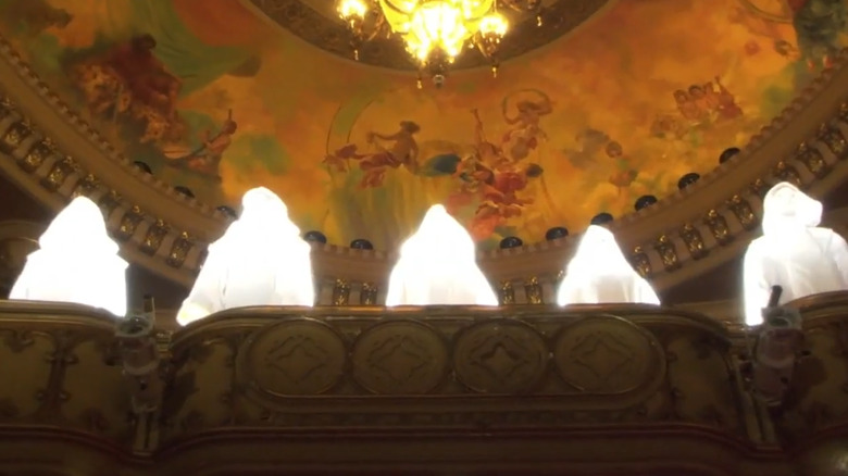 Battlestar Galactica Daybreak - the Final Five in opera house glowing with light